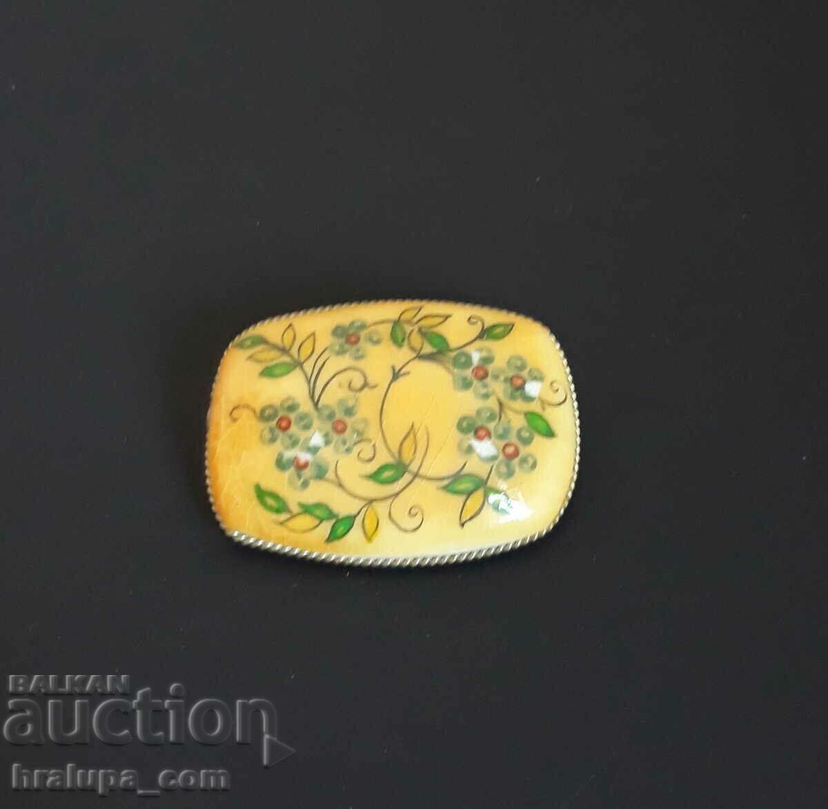 Old hand-painted stone brooch