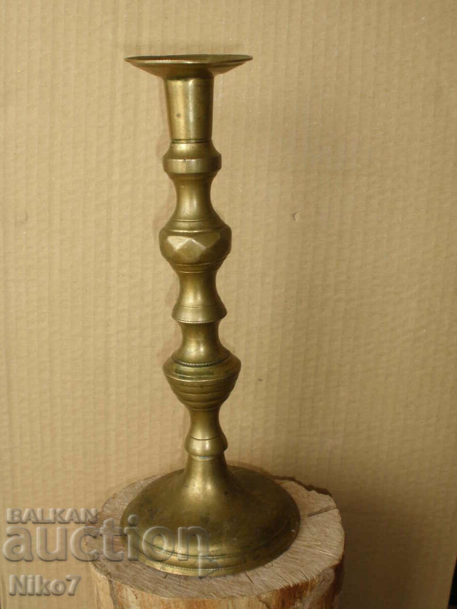 Antique, massive, brass candlestick.