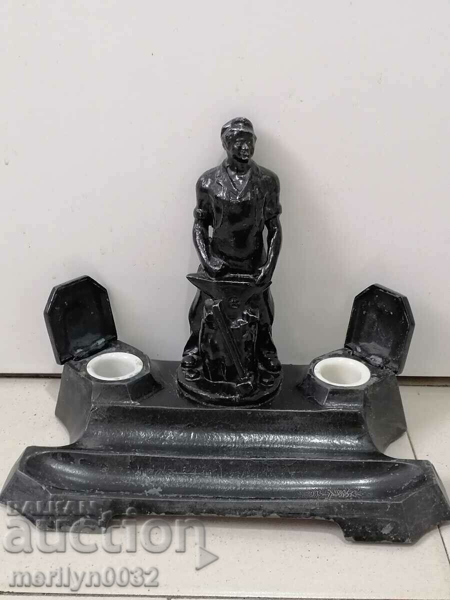 An inkwell with a figure of a blacksmith, a wounded social worker statuette of the NRB BKP with price 119.00 BGN | € 60.84 An inkwell with a figure of a blacksmith, a wounded social worker statuette of the NRB BKP with price 119.00 BGN | € 60.84
