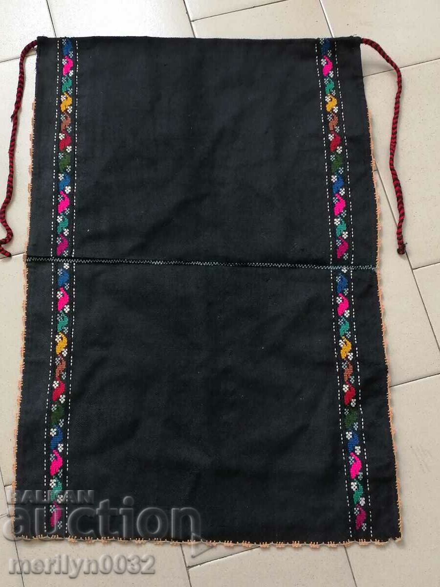 An apron made of black costume, sukman, jingle