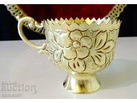 Arabic cups made of brass, embossed flowers.