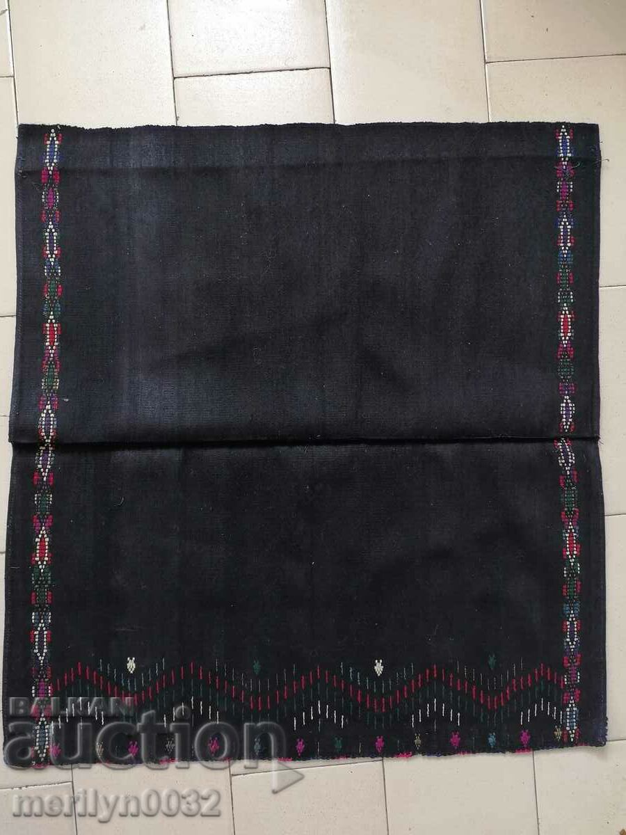 An apron made of black costume, sukman, jingle
