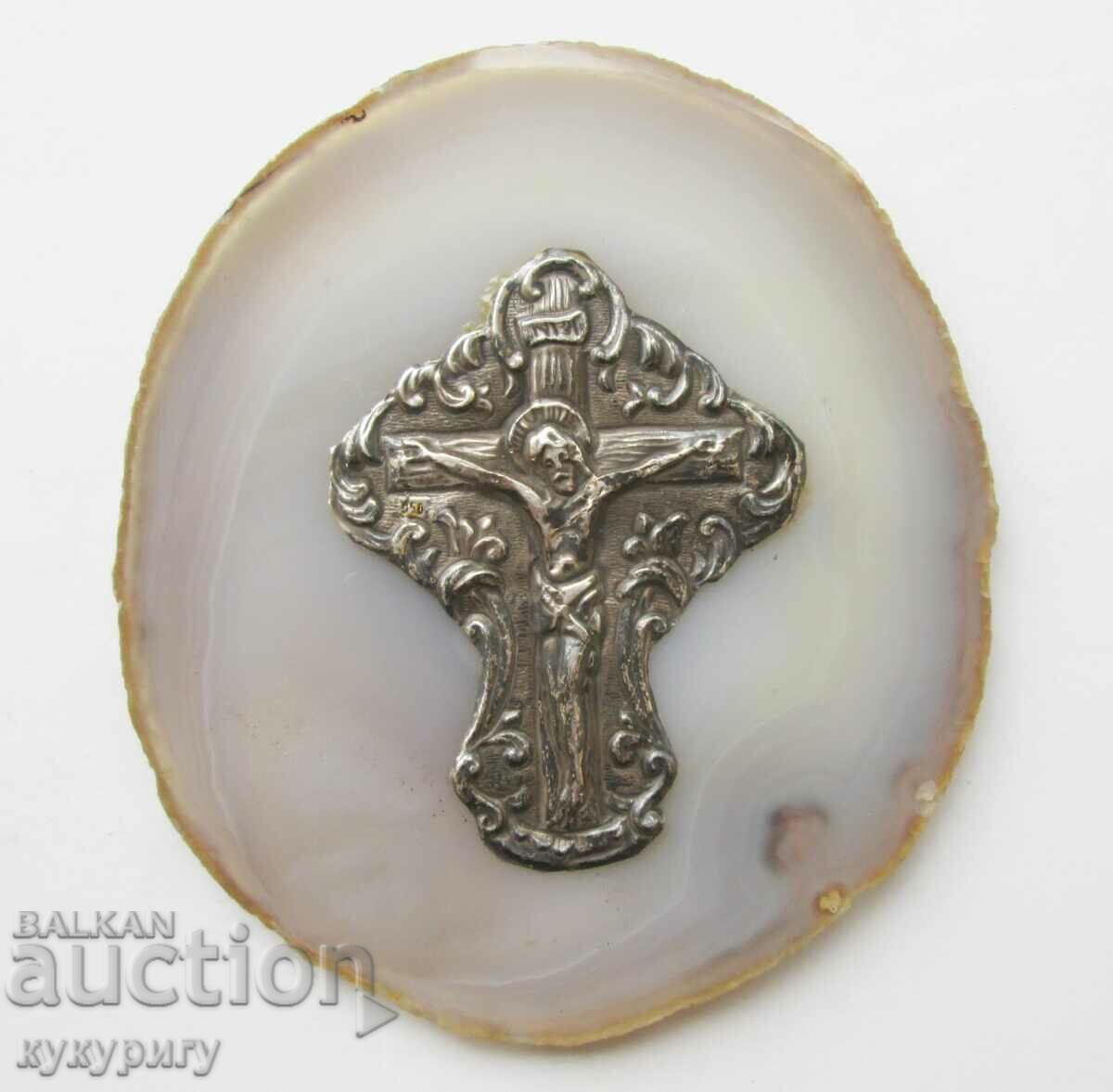 Old silver cross crucifix on natural Agate tile