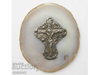 Old silver cross crucifix on natural Agate tile