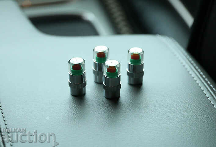 Auction 4 tire caps with a car pressure indicator Auction 4 tire caps with a car pressure indicator