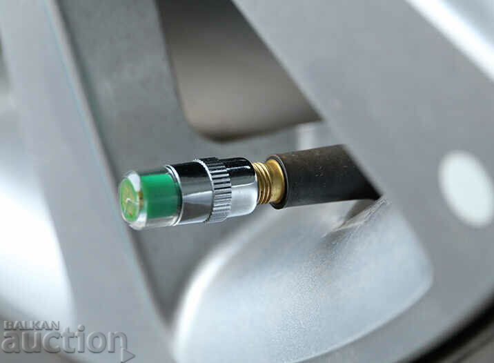 Delivery of 4 tire caps with a car pressure indicator Delivery of 4 tire caps with a car pressure indicator