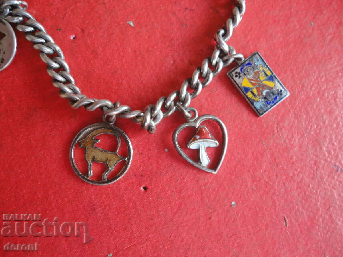 Auction  Great silver bracelet charms