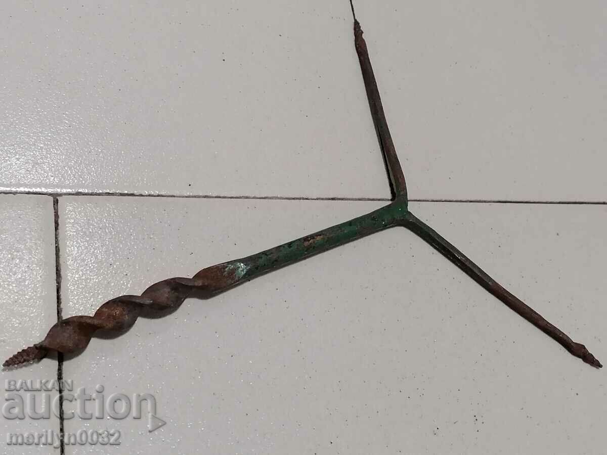 Auction Ancient crutch, burgundy, screwdriver, wrought iron Auction Ancient crutch, burgundy, screwdriver, wrought iron