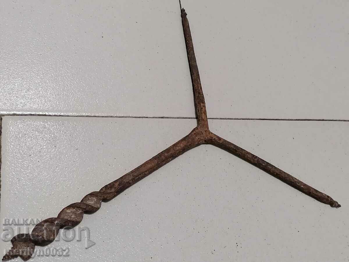 Auction Ancient crutch, burgundy, screwdriver, wrought iron Auction Ancient crutch, burgundy, screwdriver, wrought iron