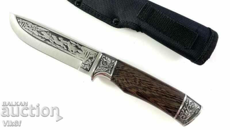 Πλούσια διπλής όψης εγχάρακτο κυνηγετικό μαχαίρι με ένθετους λύκους