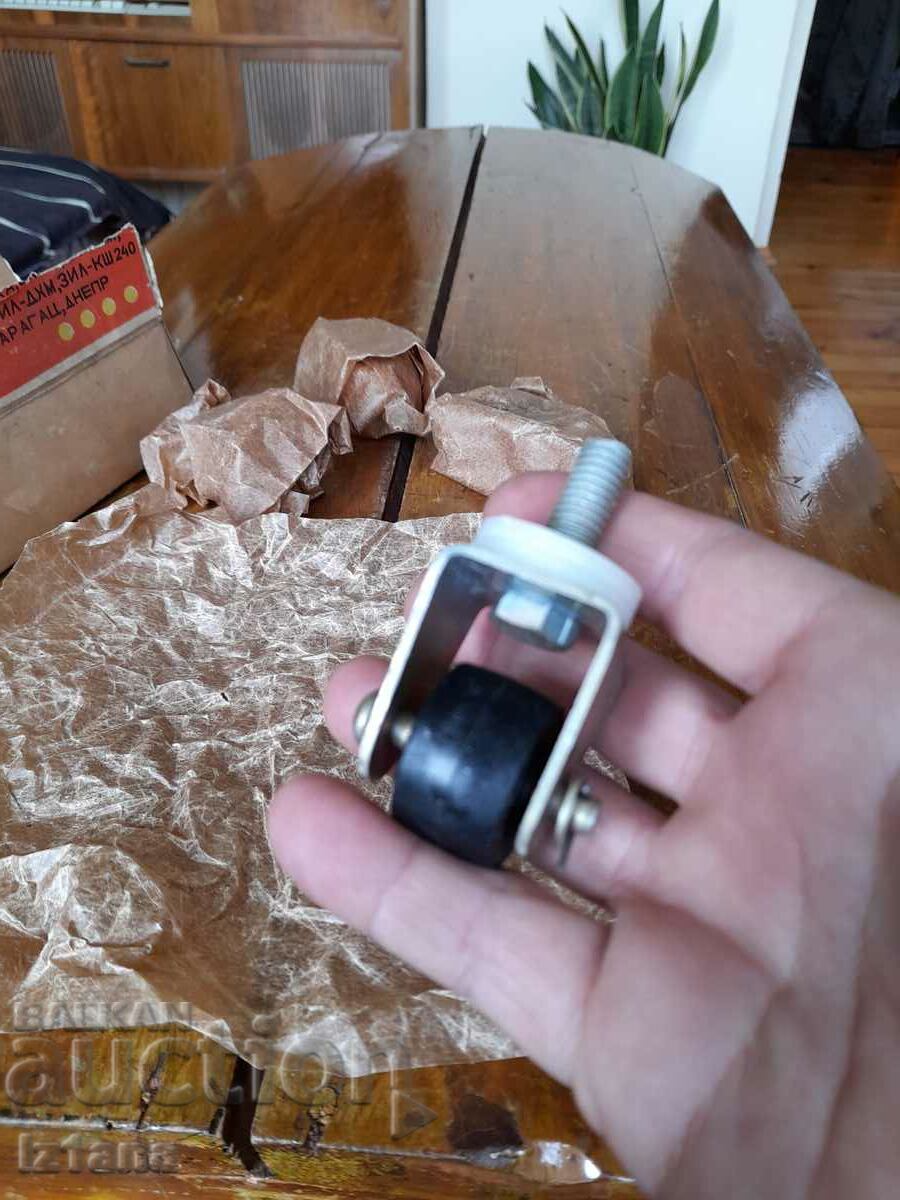 Auction Old wheels, rollers for moving a refrigerator Auction Old wheels, rollers for moving a refrigerator