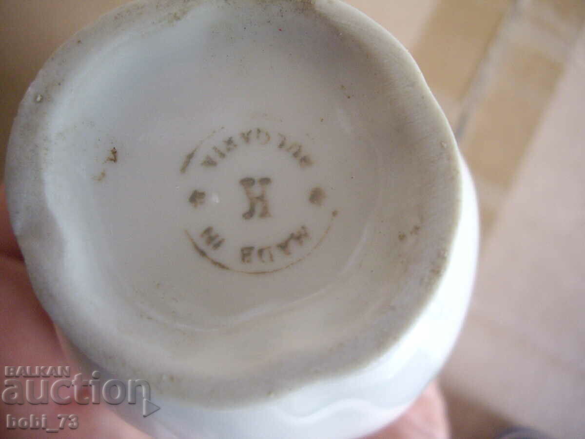 Auction Porcelain milk jug. Auction Porcelain milk jug.