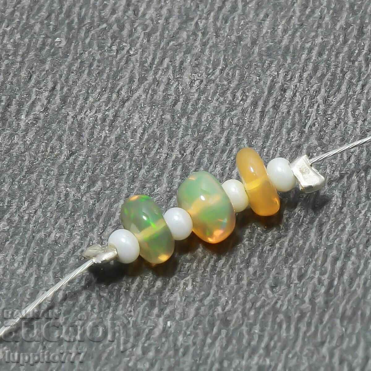 Φυσικό Αιθιοπικό οπάλιο 4,10 καρατίων με τιμή 39.99 BGN | € 20.45 Φυσικό Αιθιοπικό οπάλιο 4,10 καρατίων με τιμή 39.99 BGN | € 20.45