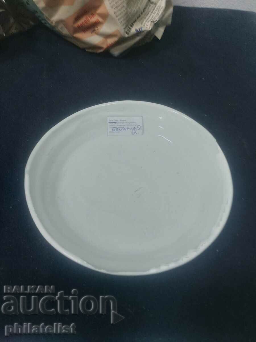 white saucer with price 10.00 BGN | € 5.11 white saucer with price 10.00 BGN | € 5.11