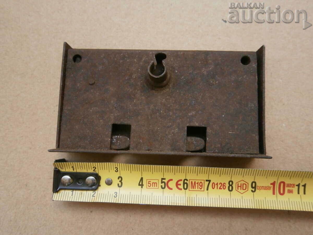 Delivery of latch lock from an antique chest of drawers Delivery of latch lock from an antique chest of drawers