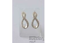 New silver earrings with zircon stones, length about 2.5 cm.