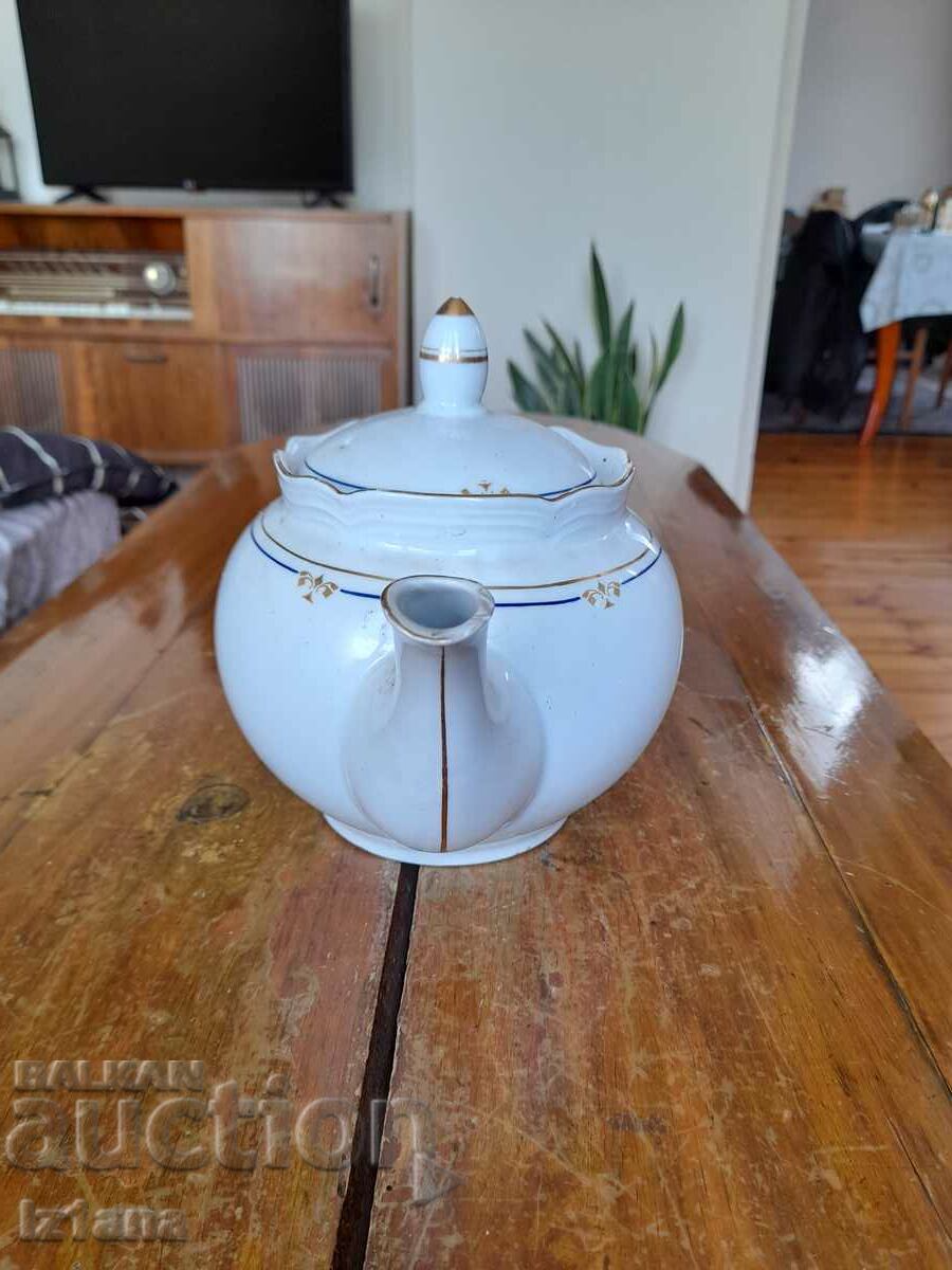 An old porcelain teapot with price 25.00 BGN | € 12.78 An old porcelain teapot with price 25.00 BGN | € 12.78