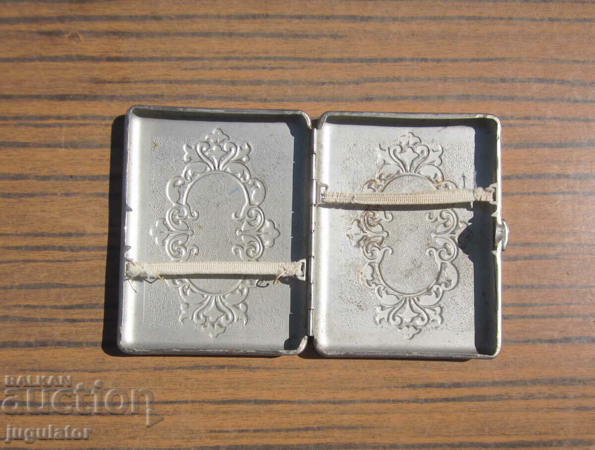 Delivery of old antique metal snuffbox with ornaments Delivery of old antique metal snuffbox with ornaments