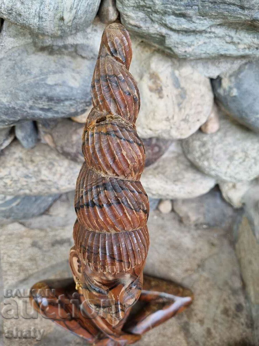 Auction Large wooden figure. A woman. Auction Large wooden figure. A woman.