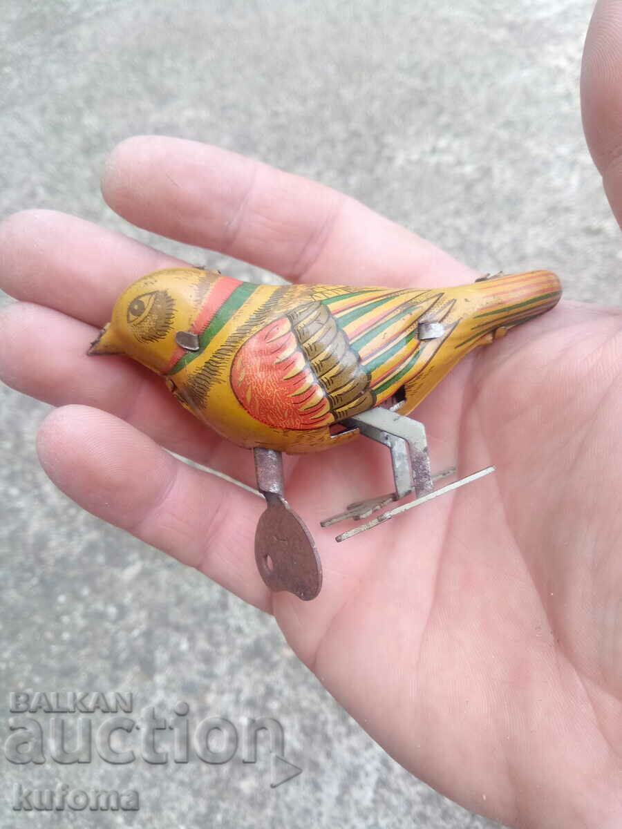 Old mechanical tin toy with key with price 49.99 BGN | € 25.56 Old mechanical tin toy with key with price 49.99 BGN | € 25.56