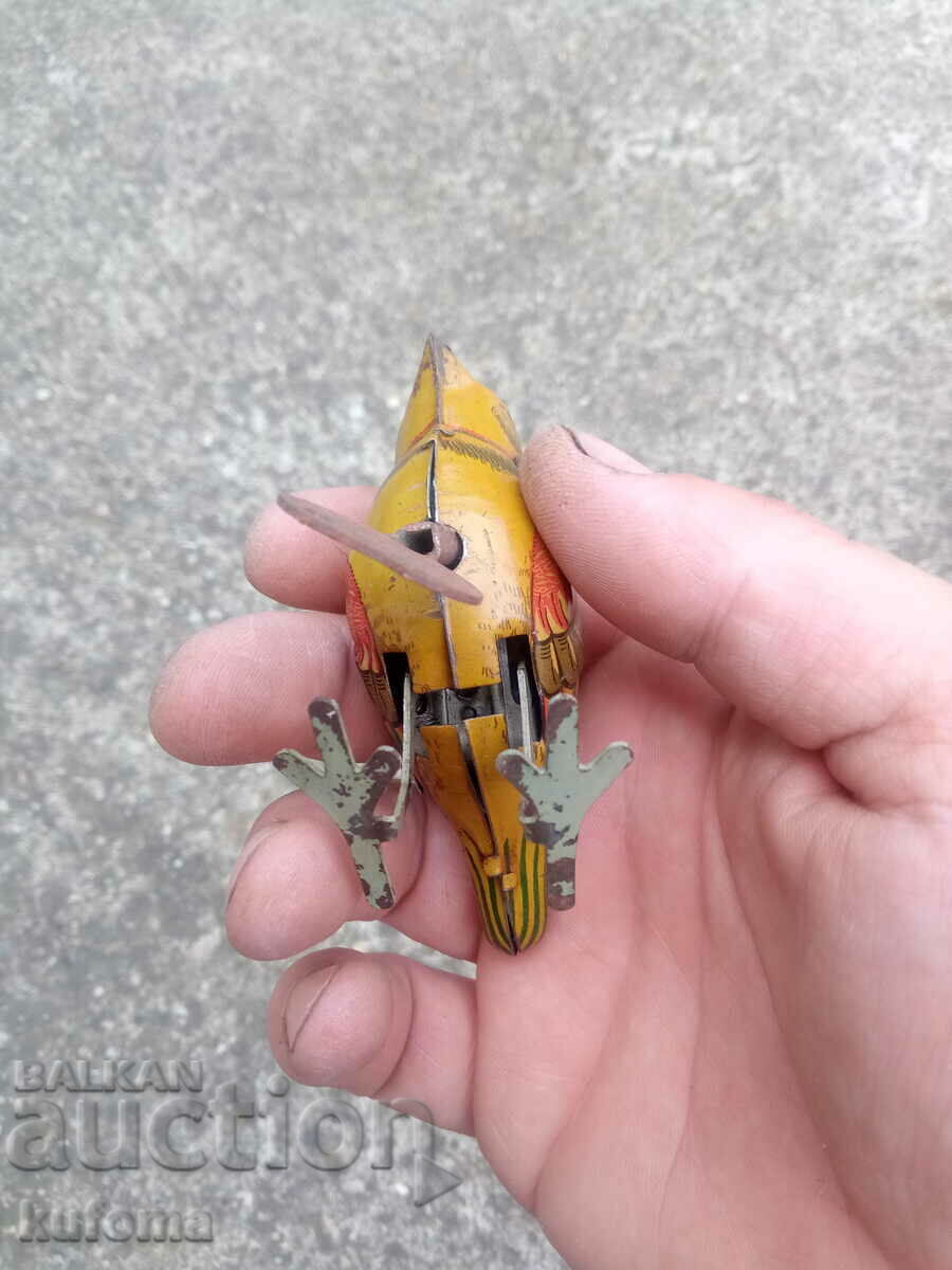 Auction Old mechanical tin toy with key Auction Old mechanical tin toy with key