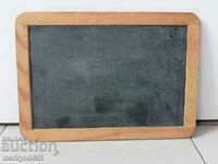 Writing board with a coil from a cell school board