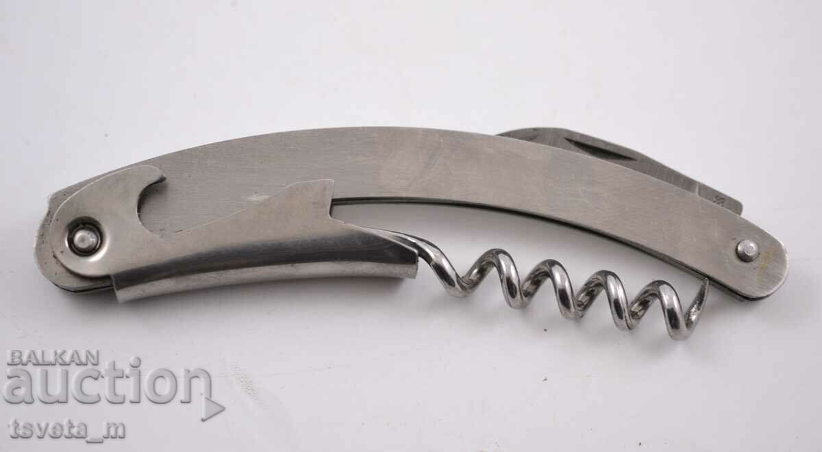 Corkscrew with opener and knife