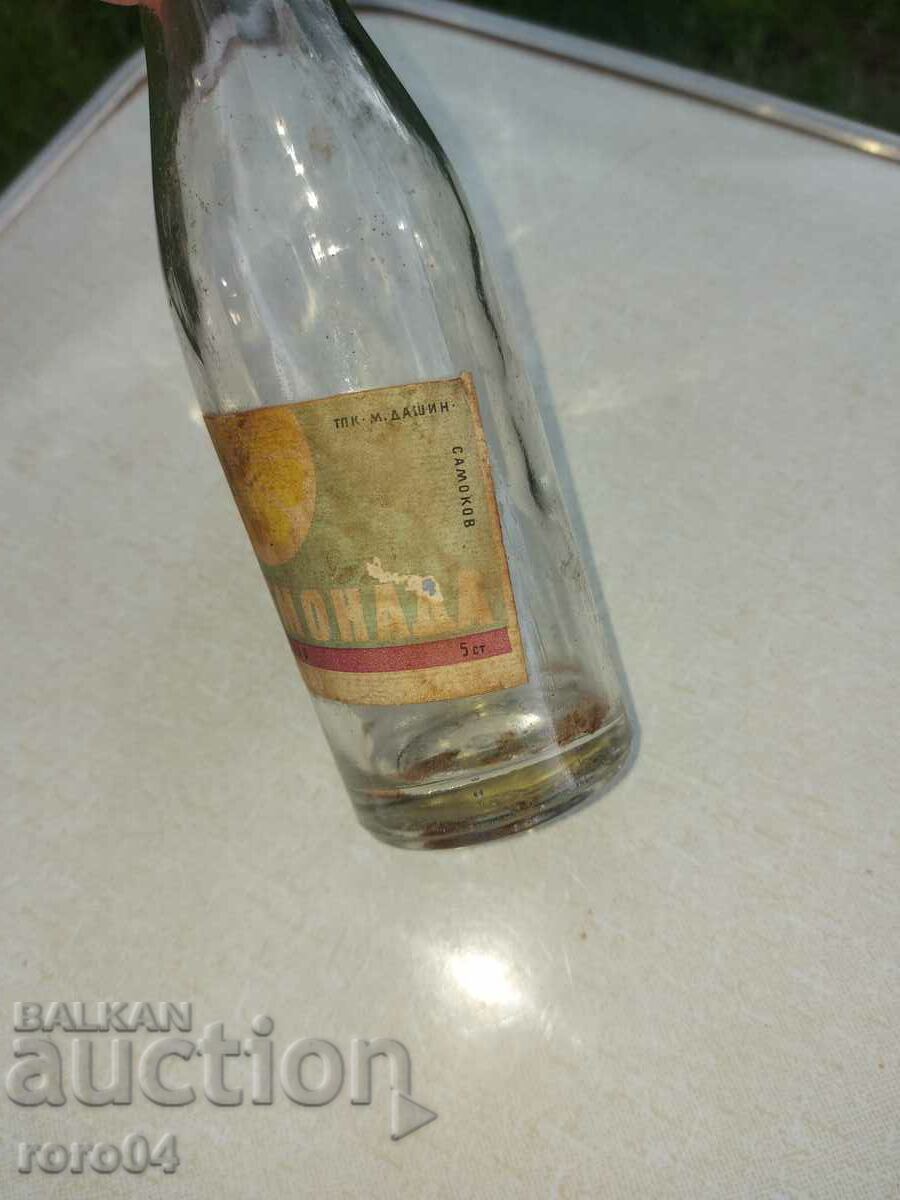 Auction BOTTLE - LEMONADE - SAMPLE 1955 Auction BOTTLE - LEMONADE - SAMPLE 1955
