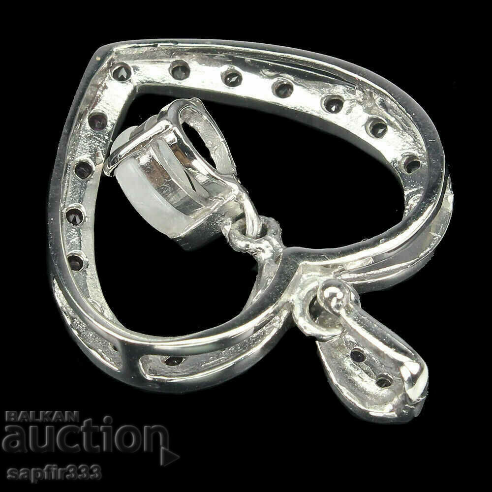 Auction FINE DESIGNER MEDALLION WITH NATURAL MOON STONE GARNETS Auction FINE DESIGNER MEDALLION WITH NATURAL MOON STONE GARNETS