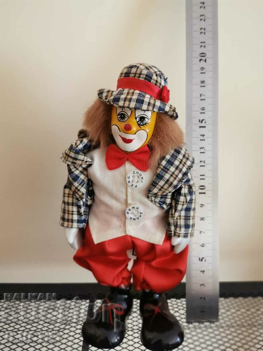 porcelain clown with clothes