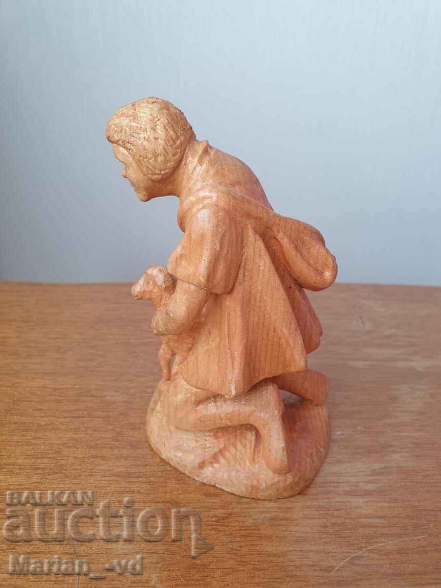 Auction An old wooden figure Auction An old wooden figure