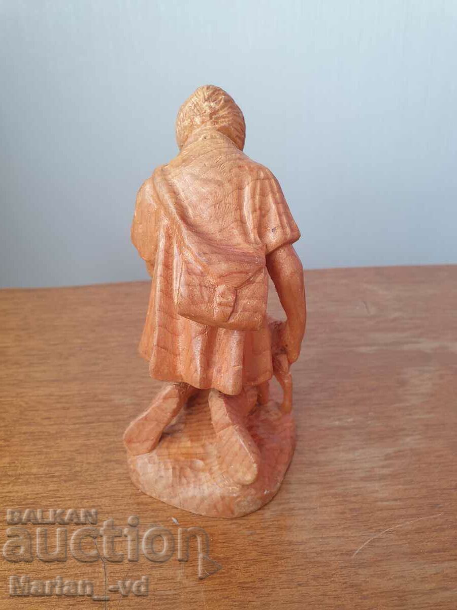 Delivery of An old wooden figure Delivery of An old wooden figure