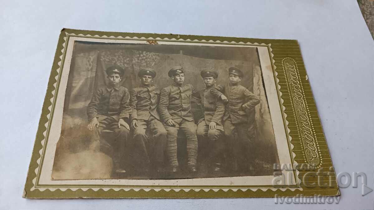 Photo Five young men in military uniforms Cardboard