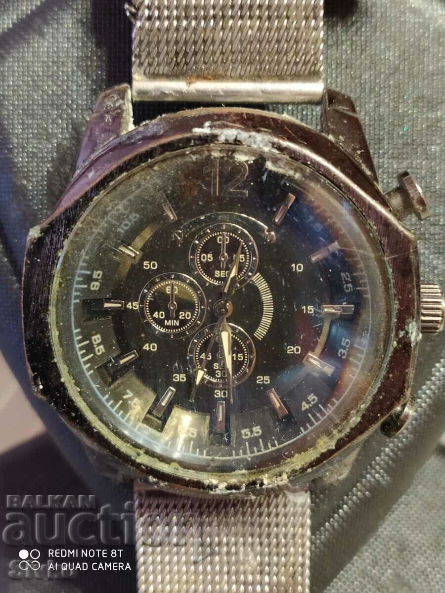 A watch with a chain