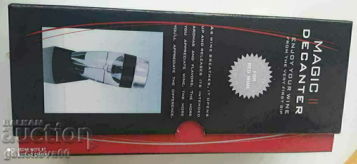Auction  Wine decanter with filter and stand in a box