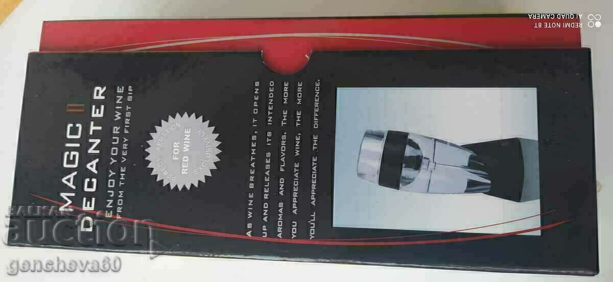 Wine decanter with filter and stand in a box