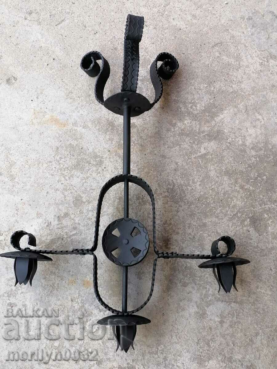 Auction  Old forged candlestick, candle, candelabra