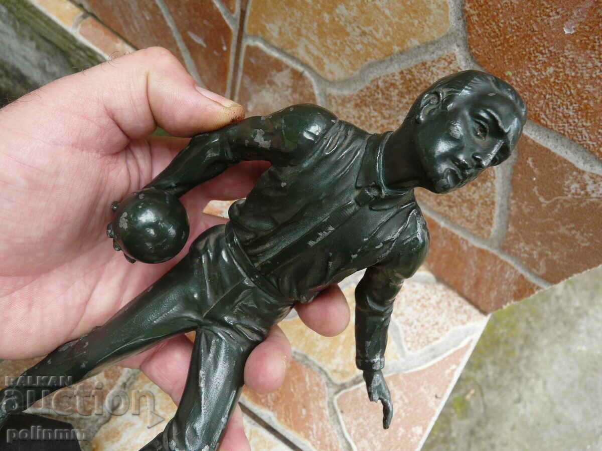 Auction An old metal figure Auction An old metal figure