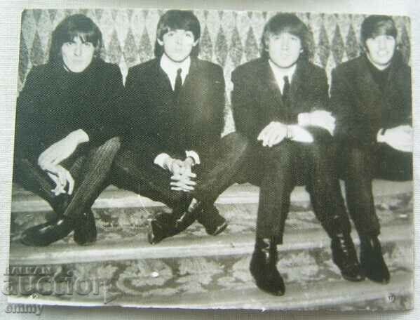 Auction Old small photo of pop/rock band The Beatles - 2 pieces Auction Old small photo of pop/rock band The Beatles - 2 pieces