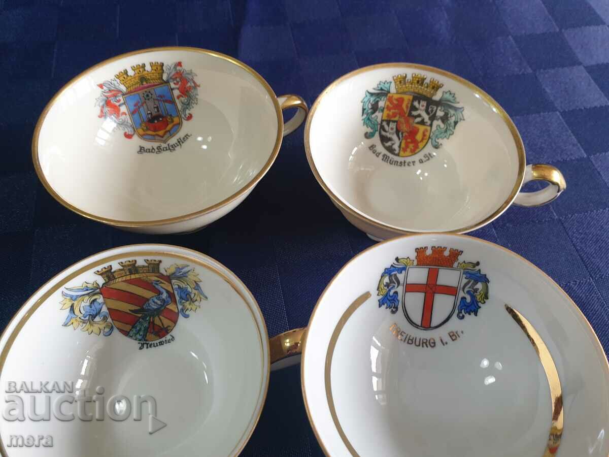 Delivery of A collectible porcelain set of four Delivery of A collectible porcelain set of four