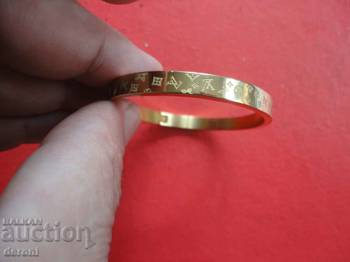 Παράδοση Υπέροχο επιχρυσωμένο βραχιόλι Louis Vuitton