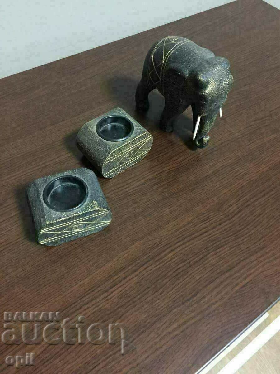 Elephant figurine with two candlesticks