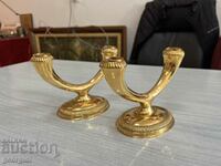 A luxury set of gilded candlesticks. #4192