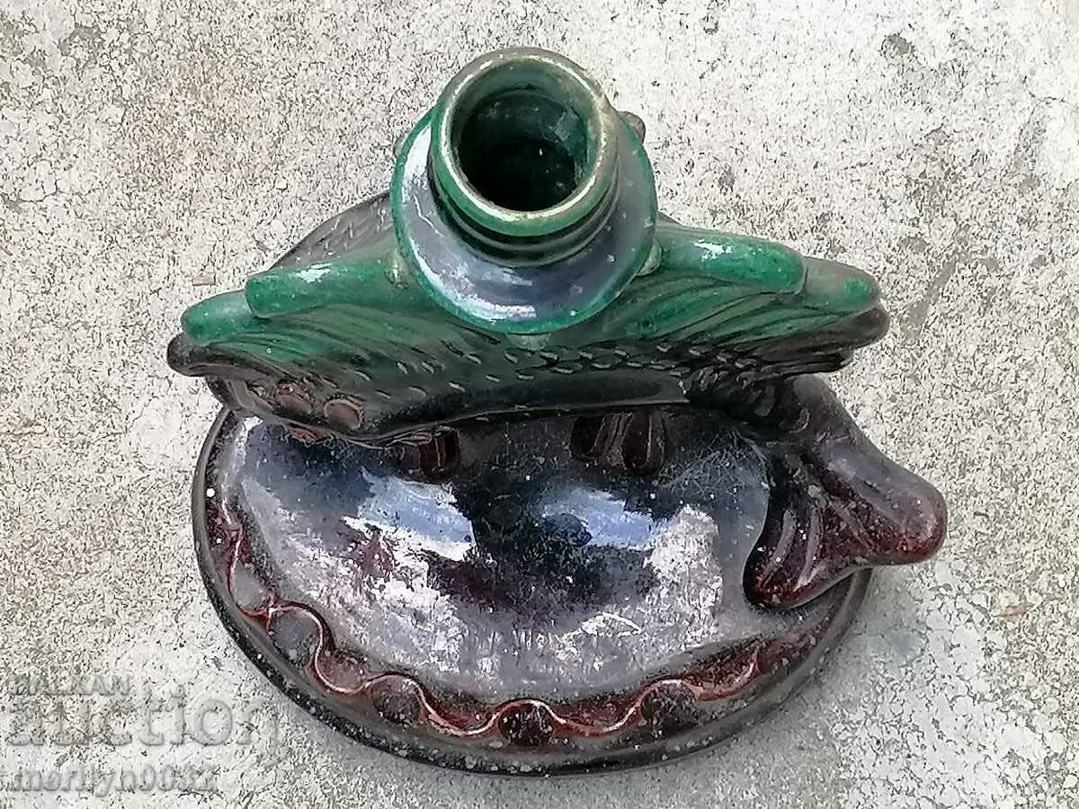 Delivery of Old ceramic candlestick with a figure