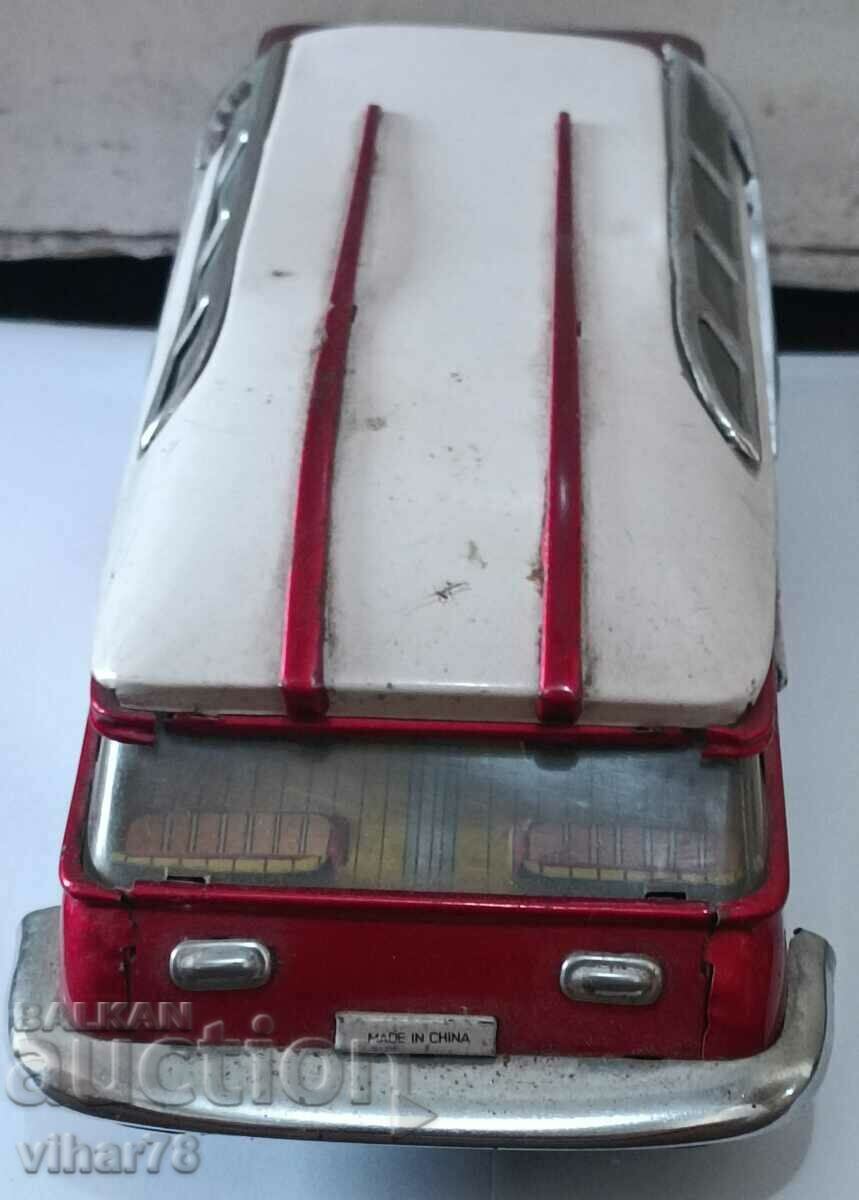 Auction  old tin toy tourist bus