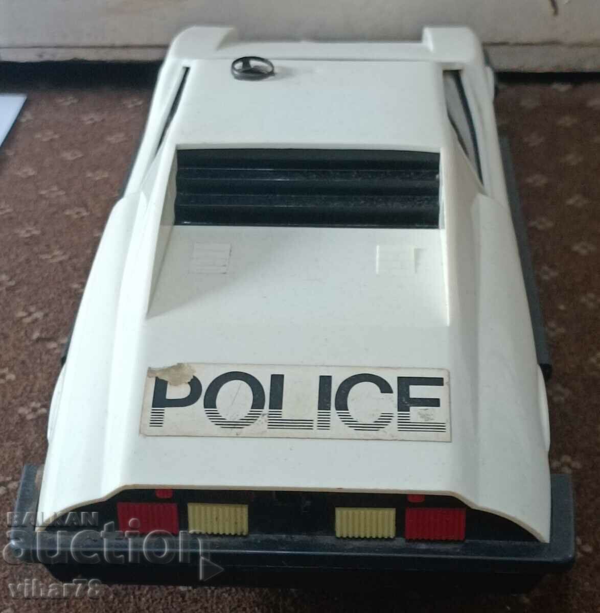 Livrarea O mașină mare de poliție din plastic