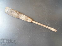 Old screwdriver, wooden handle