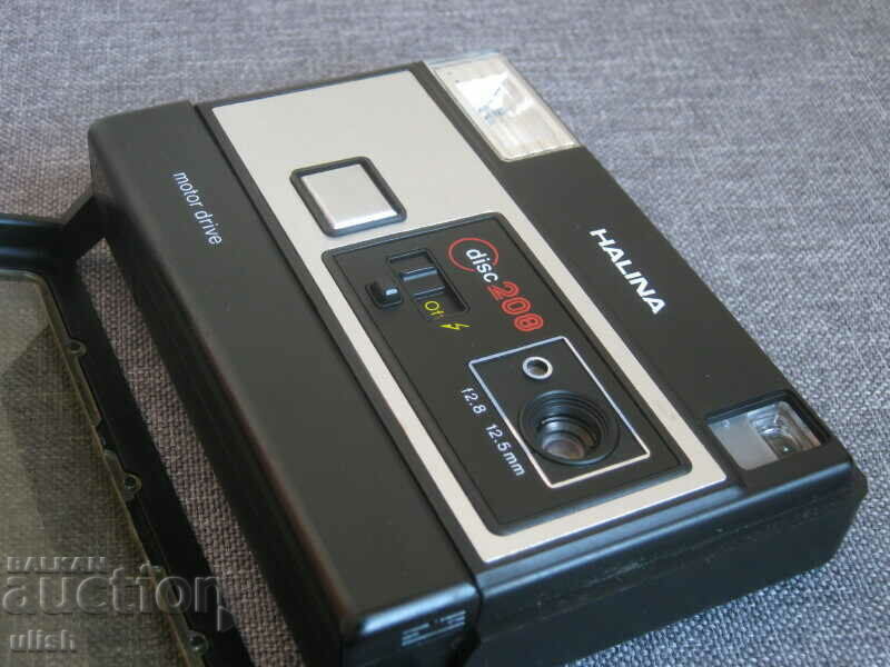 Auction 1980 Halina Disc 208 motor drive camera Auction 1980 Halina Disc 208 motor drive camera