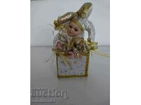 Porcelain doll music box