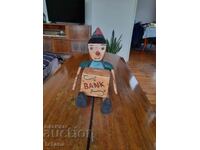 Pușculiță veche din lemn Pinocchio